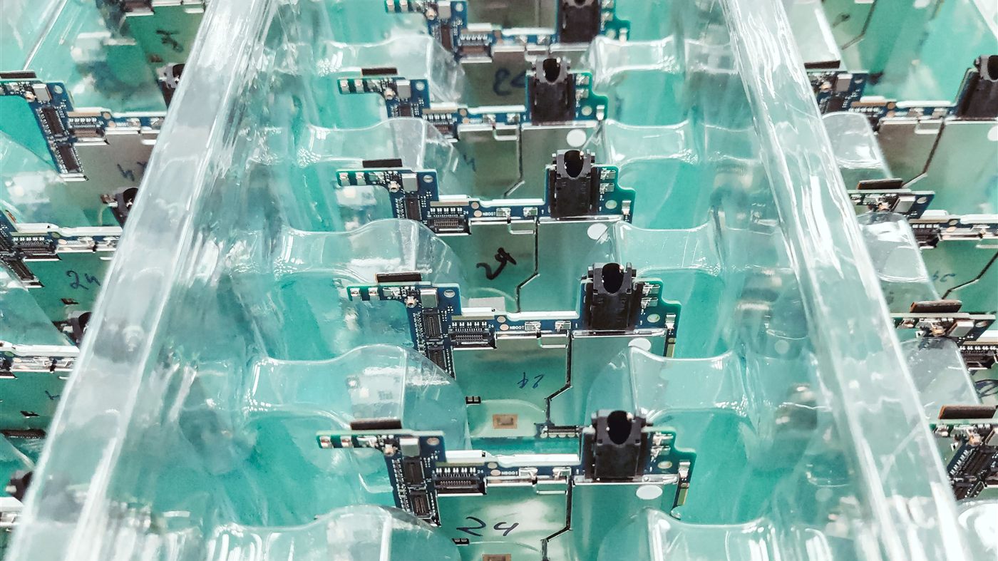 Electronic circuit boards packaged on a production line